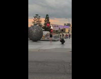 Woman black dress tiktok dance sidewalk