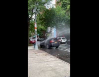 Free car wash from broken fire hydrant 