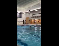 Guy does front flip onto garland fail