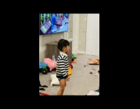 Little boy in black and white stripes counts wrong