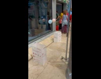 Deflated Balloons Float on Air in Airport