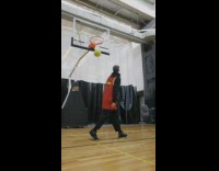 Guy does basketball tricks on one leg 