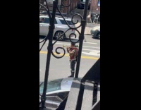 Collab WINY - Man plays trombone and dance on street