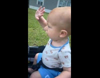 Woman pretends to be cop flagging ride on toy car 