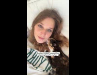 Cat cannot sleep without biting woman face