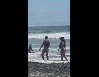 Guy wears same one piece swimsuit as his girl friend 