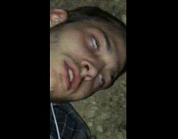 guy checkered shirt asleep eyes rolling back