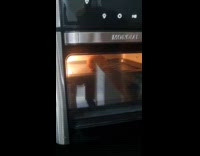 Bread spins on the tray inside airfryer
