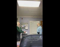 Two women laugh in sync when sticky ball stuck on ceiling