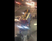 Blue bus orange inflatable tube guy dance