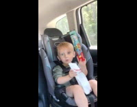 Kid shows goodie bag from dentist