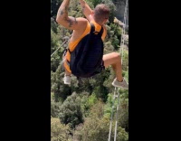 Guy drops phone while hanging on zipline