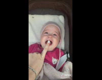 Nanny goes to walk with baby on stroller 