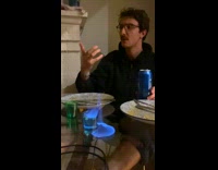 Alcohol lit from glass spreads on table