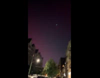 Collab WINY - Woman films northern lights from new york 
