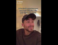 Guy laughs with friend who vapes 