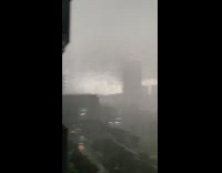 Strong winds form rain waves balcony storm