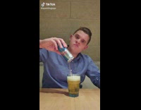 Guy records himself drinking cup of red bull in one gulp