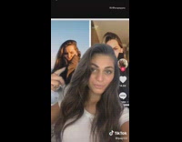 White shirt girl looks like mila kunis 