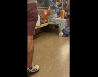 Woman paints body blue during train ride