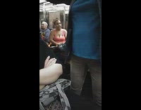 Woman red pink tank top arguing with passenger on train