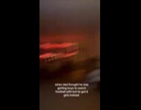 Family cheers while they watched football game