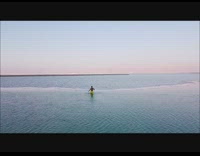 Yellow shorts guy salt flats water drone 