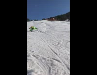 Skier jumps off ramp crashes into camera
