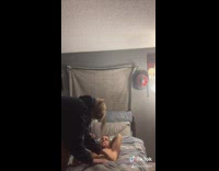 Girl pushes boyfriend on bed body slam 