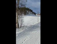 Guy with paraglider land ski lift slope