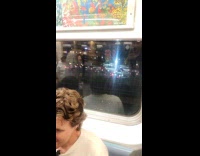 Passengers cheer as train conductor announce Mets win