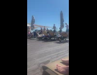 Guys black shorts superhero entrance dive pool 