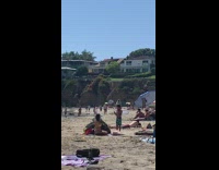 Little boy yellow bikini mom beach sand