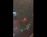 Firetruck driving plays party music on street