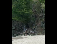 Couple dance kiss choreography beach blue cap