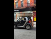 Collab WINY - Small boat on top of small tiny black car