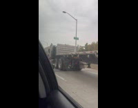 Huge truck transporting small pink toy car 
