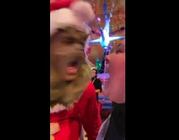 Girl at restaurant screams when christmas grinch comes to table 