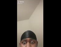 Guy thinks face is in dogs butt