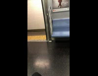 girl with glasses asleep on her pink purse