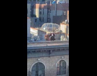Men dancing wearing venetian nobleman costumes 