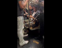 Woman with wine glass inside train subway