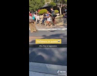 Guy girl film tiktok dance at Americana 