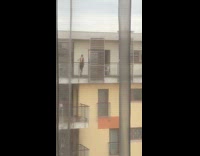 Two women dresses balcony photoshoot 