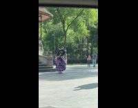 Woman purple dress lift skirt  black hat