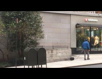 Guy walks two dachshund dogs lululemon