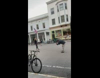 Blonde lady in black poses with western stores 