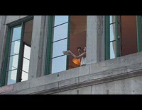 Woman pictures her food outside her building window