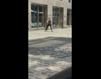 Black shirt guy punches air superdry store