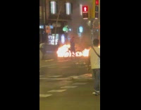 Man with bike took a selfie in front of fire